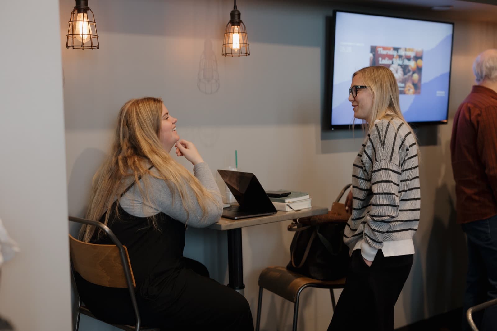 Women connecting over coffee at Pleasant Valley.